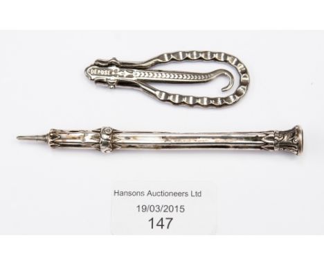 A white metal propelling pencil with an engraved amethyst seal filial; together with a folding button hook (2) 