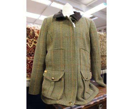 A Joules tweed size 14 country jacket, with suede collar , braided, buttoned cuff vent, patch pockets, button/clip back vent 