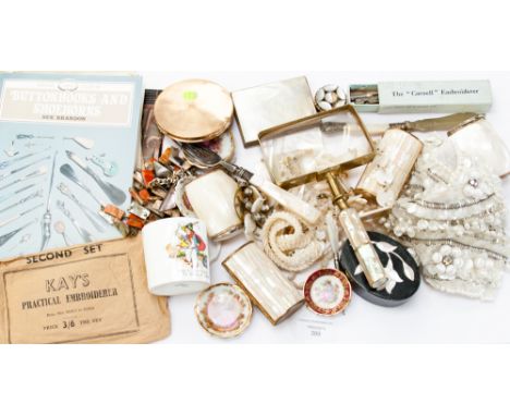 A collection of nacre beads and purses; together with a magnifying glass, button hook, show horn and reference book, etc, par