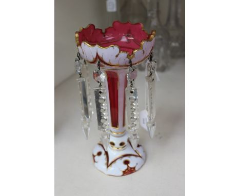 A 19th Century Bohemian overlay lustre, ruby glass with white cut away detail 