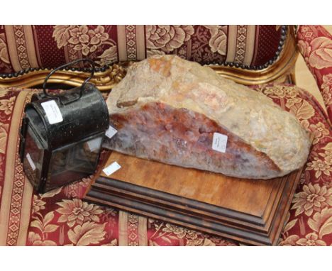 A cased Jaguar burr walnut effect blotter; together with a polished stone on plinth and a black painted tin carriage lamp (3)