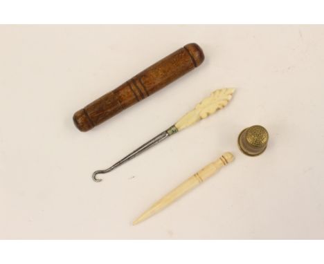 A bone crewel, bone handled button hook, wooden needlecase and thimble (4)
