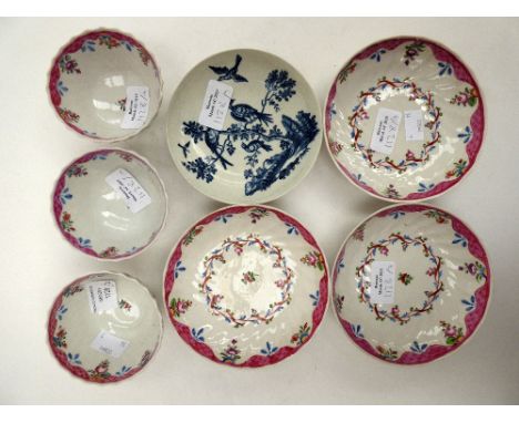 Three matching early 19th Century tea bowls and saucers, hand painted with pink borders and sprays of flowering foliage; toge