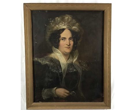 English School (mid 19th century) oil on canvas, Half length portrait of a lady, in lace bonnet, 77 x 62cm, framed