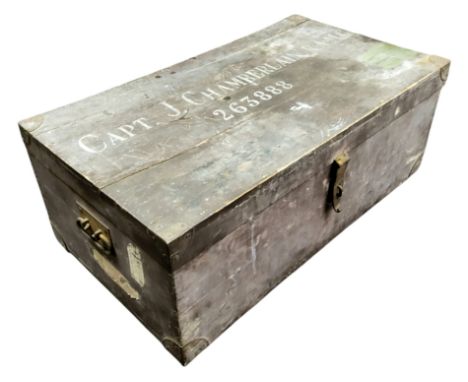 A Royal Army Medical Corps military trunk, the top stenciled 'Captain J. Chamberlain R.A.M.C 263888', drop swing handles, Sou