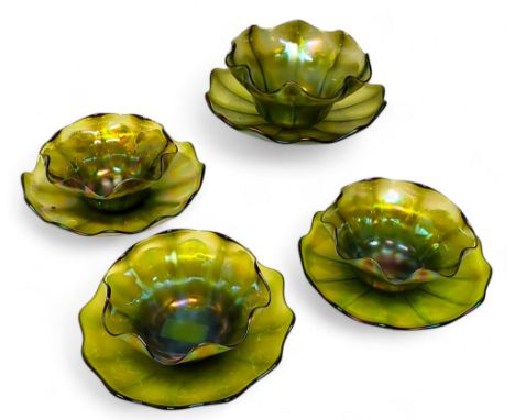 Four Loetz type martele iridescent glass bowls and saucers, wavy&nbsp;edges