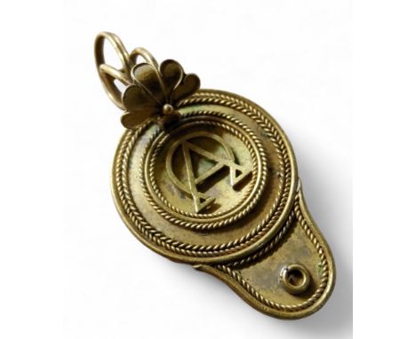An&nbsp;Antonio Carli gold coloured metal mourning pendant,&nbsp; in the form of a Roman lamp, the back set hair, 4cm long,&n