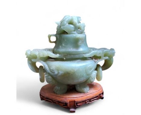 A Chinese jade censer, carved dragon cover with twin chilong dragon mask and loop handles, plinth base,&nbsp; 18cm wide, 18cm