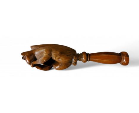 Nutcrackers - a Black Forest novelty screw-action nut cracker, carved with a squirrel, 18cm long, c.1870
