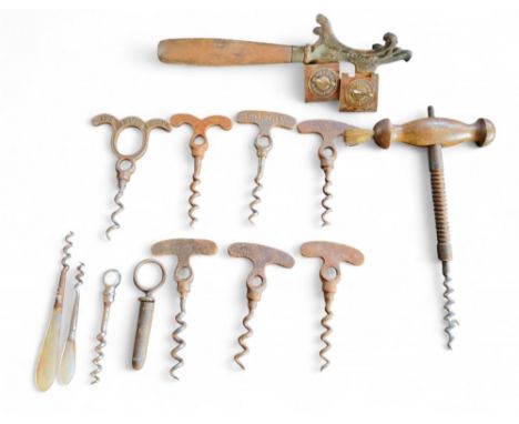 A Victorian Walcot's Patent knife sharpener, c.1880;   a 19th century corkscrew, turned wooden handle with brush, 20cm long; 