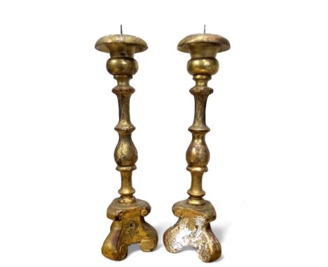 A pair 17th century style gilt wood pricket candlestick, 49cm high