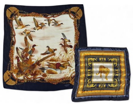 A vintage Hermes style silk scarf, in autumnal colours the central panel depicting wild fowl in flight and swimming, blue bor
