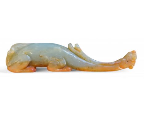 A Chinese jade carving, of an archaic beast, 18cm long