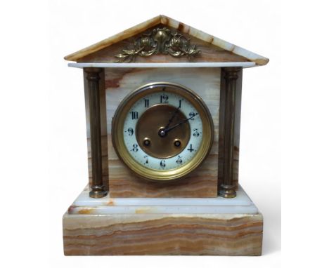 An early 20th century green striped onyx architectural mantel clock, Arabic numerals, twin winding holes, free standing gilt 
