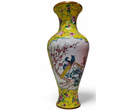 A Qing dynasty Canton enamel baluster shaped vase, yellow ground, decorated with two panels depicting Aesthetic pheasants ben
