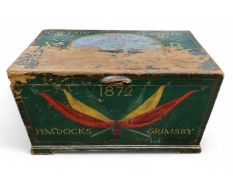 A 19th century pine trunk, painted in green, inscribed Captain Morgan, HM Docks, Grimsby, 1872, 45cm high, 79cm wide