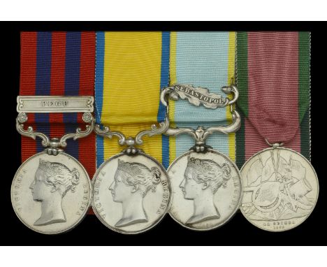 Four: Surgeon O. J. Llewellyn, Royal Navy, who landed with the Naval Brigade at the storming of the White Stockade and Dagon 