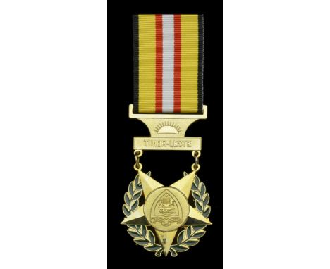 Timor-Leste, Republic, Medal of Merit, breast badge, gilt and enamel, unmarked, with related miniature award, extremely fine 