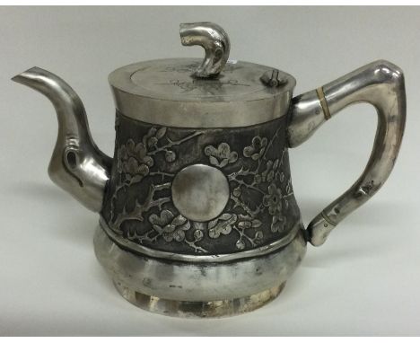 A Chinese export silver teapot. Marked to base. Approx. 400 grams. Est. £300 - £500.