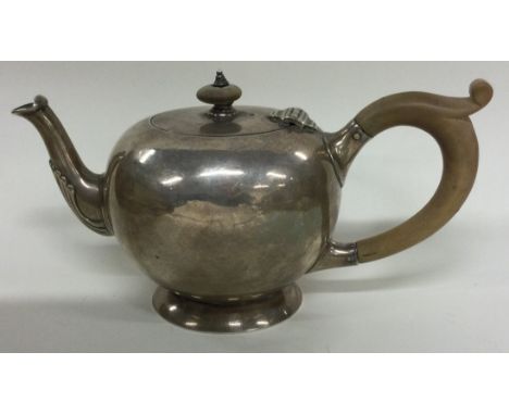 A silver bullet shaped teapot. Approx. 278 grams. Est. £250 - £300.