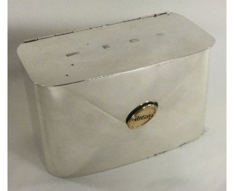 A rare silver and gold mounted novelty tea caddy. Birmingham 1997. Approx. 320 grams. Est. £250 - £300.