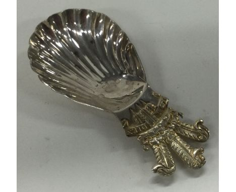A silver and parcel-gilt Prince of Wales Jubilee caddy spoon enscribed; 'Ich Dien'. London 1981. By Roberts & Belks. Approx. 