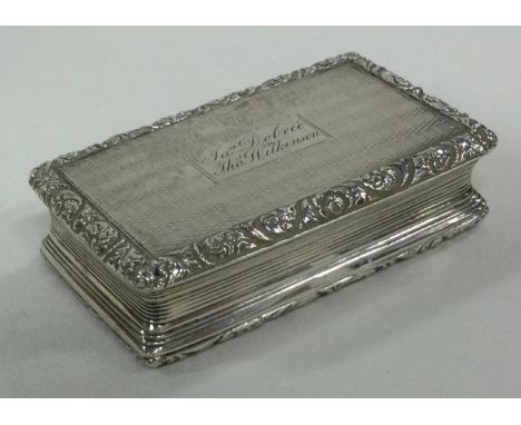 A George III silver snuff box. Birmingham 1823. By Thomas Shaw. Approx. 92 grams. Est. £150 - £200.