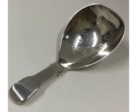 A silver caddy spoon. London 1819. By George Knight. Approx. 16 grams. Est. £30 - £40.