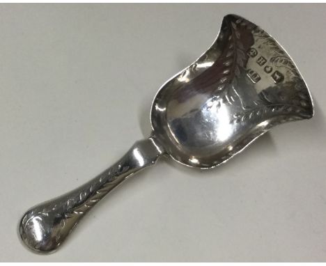 A silver caddy spoon. Birmingham 1856. By Thomas Dones. Approx. 7 grams. Est. £20 - £30.