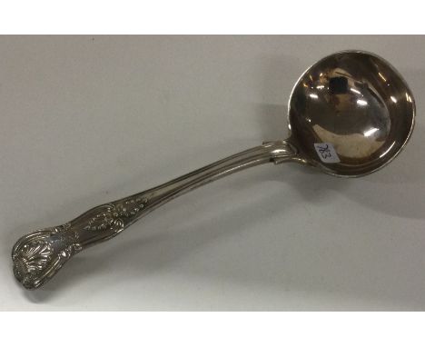 A silver Kings' pattern sauce ladle. London. Approx. 90 grams. Est. £40 - £60.