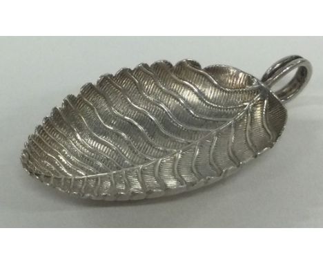 A George III silver leaf shaped caddy spoon. London 1801. By Edward Mayfield. Approx. 7 grams. Est. £100 - £150.
