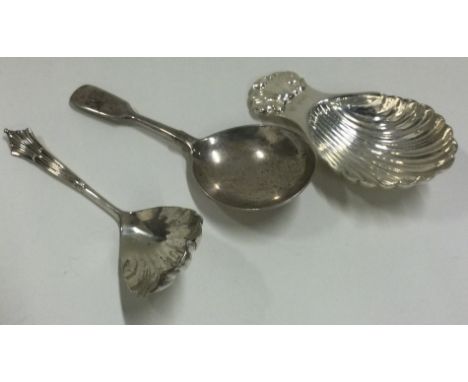 Three silver caddy spoons. London 1890 by GMJ, 1902 by RS and Sheffield 1976 by FH. Approx. 52 grams. Est. £40 - £60.