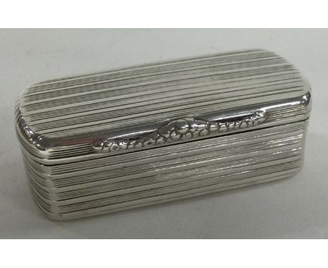 A George III reeded silver snuff box. London 1824. By Charles Rawlings. Approx. 84 grams. Est. £200 - £300.