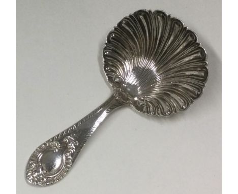 A Silver caddy spoon. Sheffield 1906. By W&H. Approx. 15 grams. Est. £20 - £30.