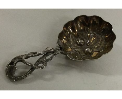 A good Victorian cast silver caddy spoon. Birmingham. Approx. 12 grams. Est. £50 - £80.
