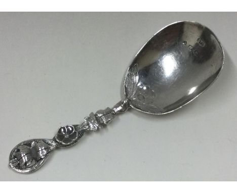 A Victorian silver caddy spoon. By H&T. Approx. 12 grams. Est. £30 - £40.