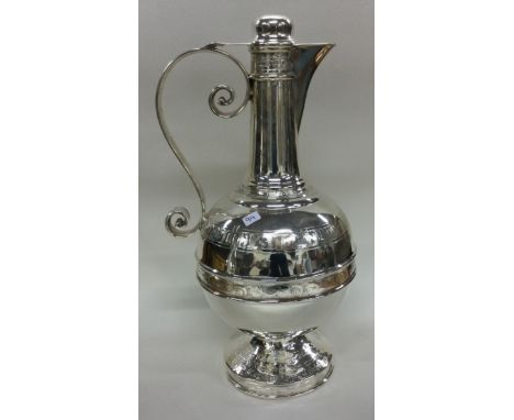 A rare Victorian silver communion wine jug. Sheffield 1879. By Henry Wilkinson. Approx. 722 grams. Est. £600 - £800.