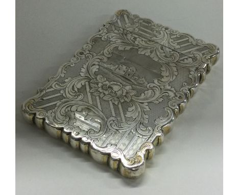 A Victorian silver card case engraved with village scene and engine turned flowers. Birmingham 1851. By Yapp & Woodward. Appr