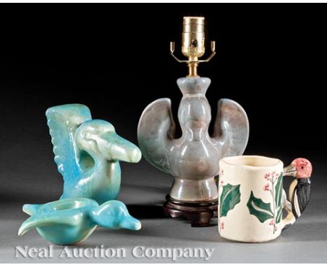 Four Shearwater Pottery Figural Pieces, marked, incl. pelican bookend, duck ashtray, gull lamp, and woodpecker cup, gull with