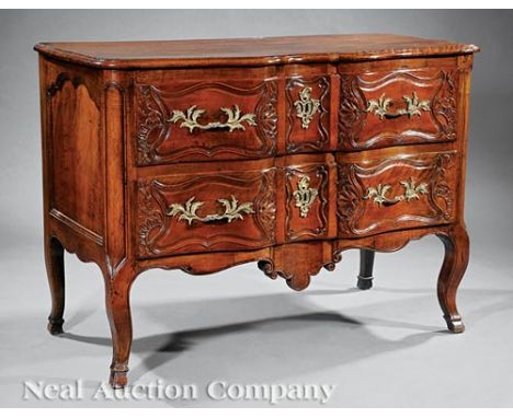 Louis XV Fruitwood Commode, 18th c., serpentine top, two shell carved paneled drawers, shaped skirt, cabriole legs, hoof feet