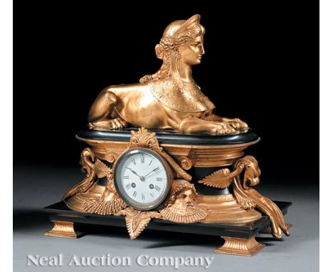 Egyptian Revival Gilt Metal and Black Marble Mantel Clock, late 19th c., white enamel dial, the works marked "Blot & Drouard 