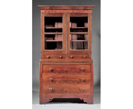 American Late Classical Mahogany Secretary-Bookcase, mid-19th c., ogee cornice, beaded glazed doors over two short drawers, f