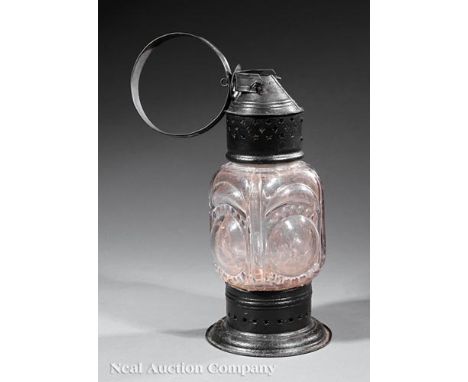 Antique "Configurated" Tin Lantern, pierced tin mounts with molded glass globe, simulating convex lenses, h. 17 1/2 in., dia.