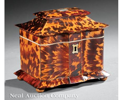 George III Tortoiseshell Sarcophagus-Form Tea Caddy, early 19th c., interior fitted with two lidded compartments, bun feet, h