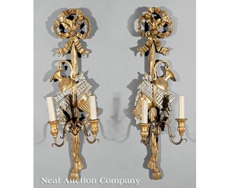 Pair of Louis XVI-Style Carved Giltwood Two-Light Sconces, each in the form of a beribboned trophee, h. 28 in., w. 9 in., d. 