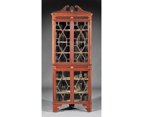 George III-Style Inlaid Mahogany Corner Cupboard, 19th c., broken scroll pediment, astragal glazed doors, shaped bracket feet