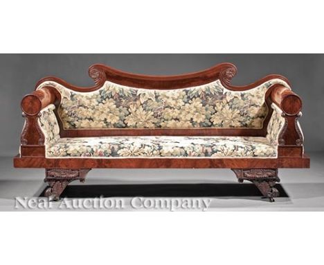 American Late Classical Carved Mahogany Sofa, scrolled crest, tubular arms on lyre supports, blocked seat rail, acanthus-carv