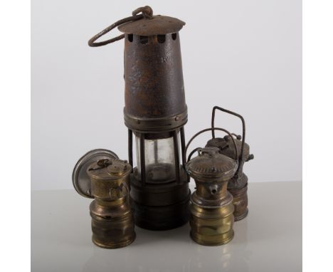 Hailwoods type 01 Miners lamp, 28cm; together with a quantity of other Miners lamps, various sizes, and a WWI shell casing bo