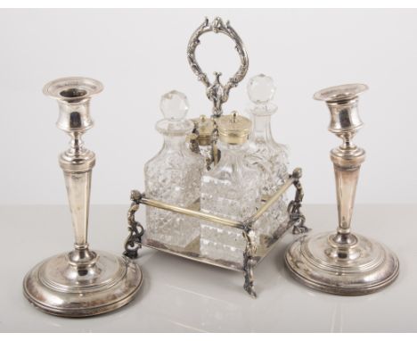 Pair of silver candlestick, with other platedware, teapots and cruet set, one box.