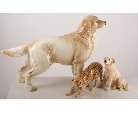 Beswick figure of a cheetah, large Goebel figure of a Labrador dog, 31cm tall, two Border Fine Art figures of Labradors and a